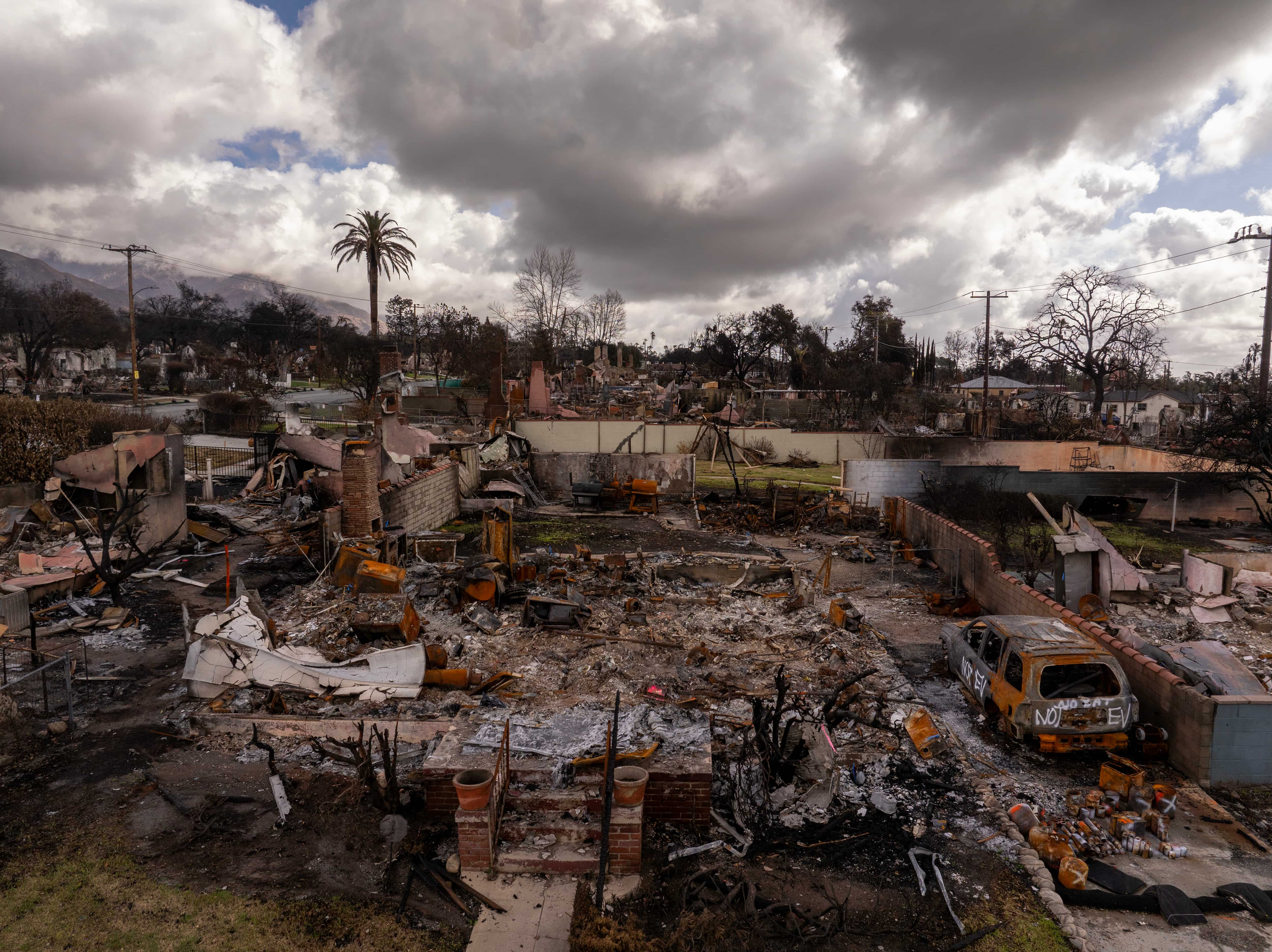 Dark clouds hang over a community in California devastated from wildfire.