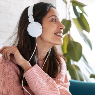 Image of woman with headphones on.