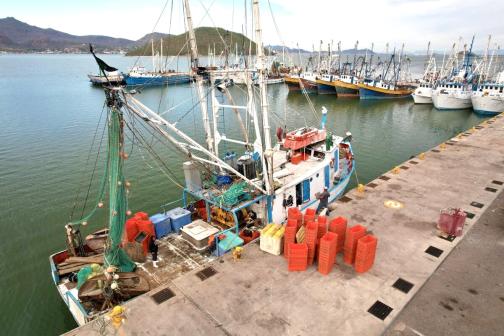 A fishing boat at the dock.