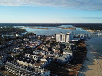 Aerial view of Virginia Beach - Chesapeake Bay beach with large, grassy dunes